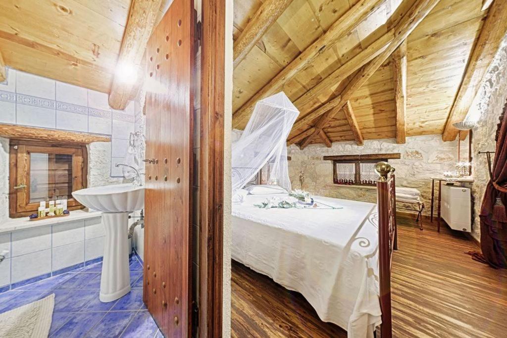 Posteľ alebo postele v izbe v ubytovaní Villa Poseidon Residence