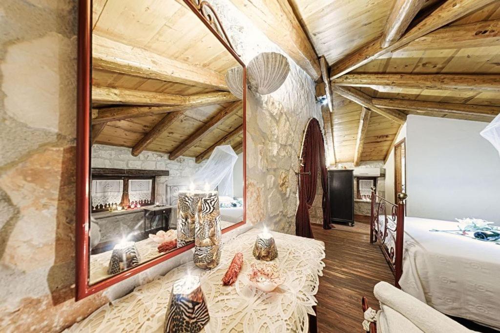 Posteľ alebo postele v izbe v ubytovaní Villa Poseidon Residence