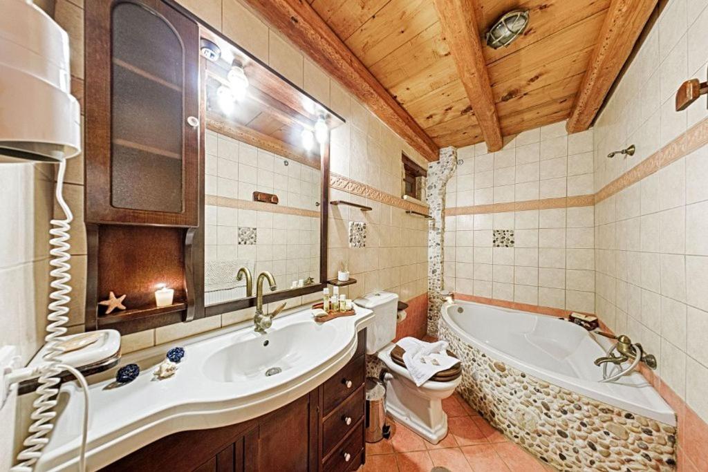 Kúpeľňa v ubytovaní Villa Poseidon Residence