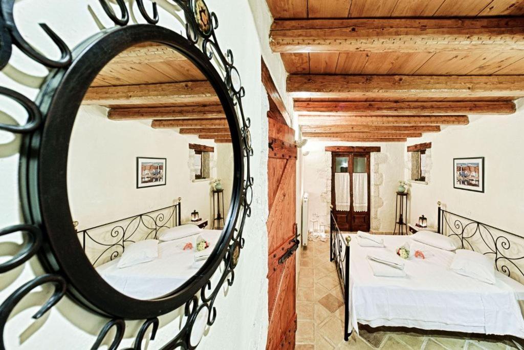 Posteľ alebo postele v izbe v ubytovaní Villa Poseidon Residence