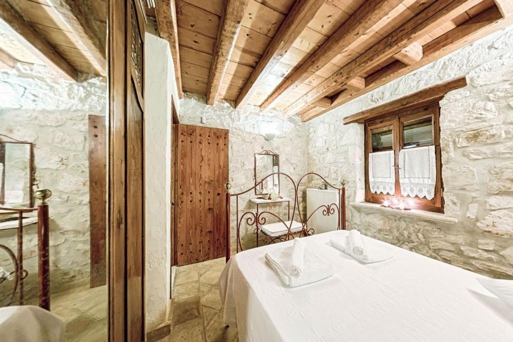 Posteľ alebo postele v izbe v ubytovaní Villa Poseidon Residence