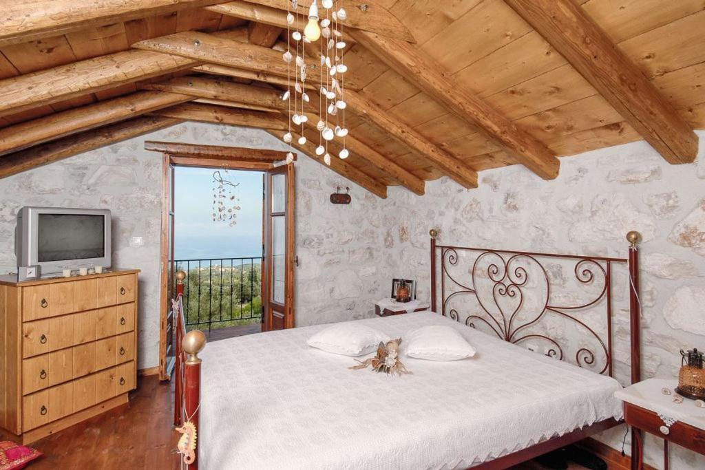 Posteľ alebo postele v izbe v ubytovaní Villa Poseidon Residence