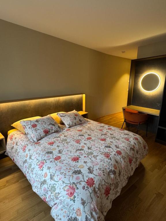 Ένα ή περισσότερα κρεβάτια σε δωμάτιο στο Auberge de l'Étoile
