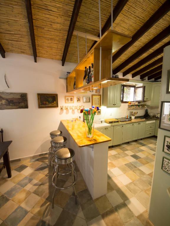 Kuchyň nebo kuchyňský kout v ubytování Guest House Bellaguarda