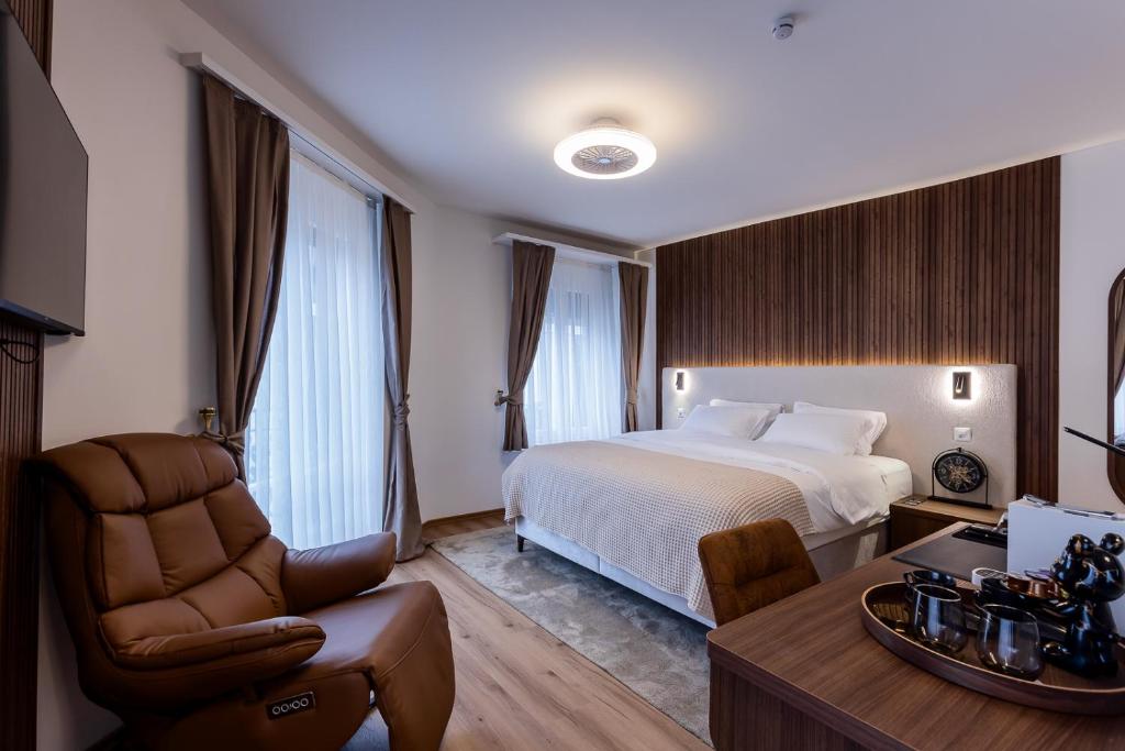 Postel nebo postele na pokoji v ubytování Deluxe Appart & Hotel Zürich Kreis 4