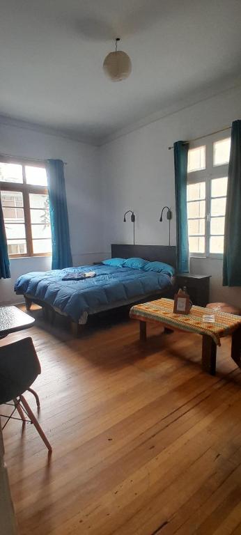 Postel nebo postele na pokoji v ubytování Hostal Po