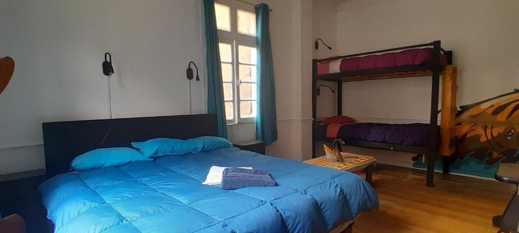 Postel nebo postele na pokoji v ubytování Hostal Po