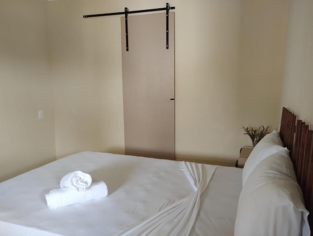 Postel nebo postele na pokoji v ubytování Boipeba Encantos