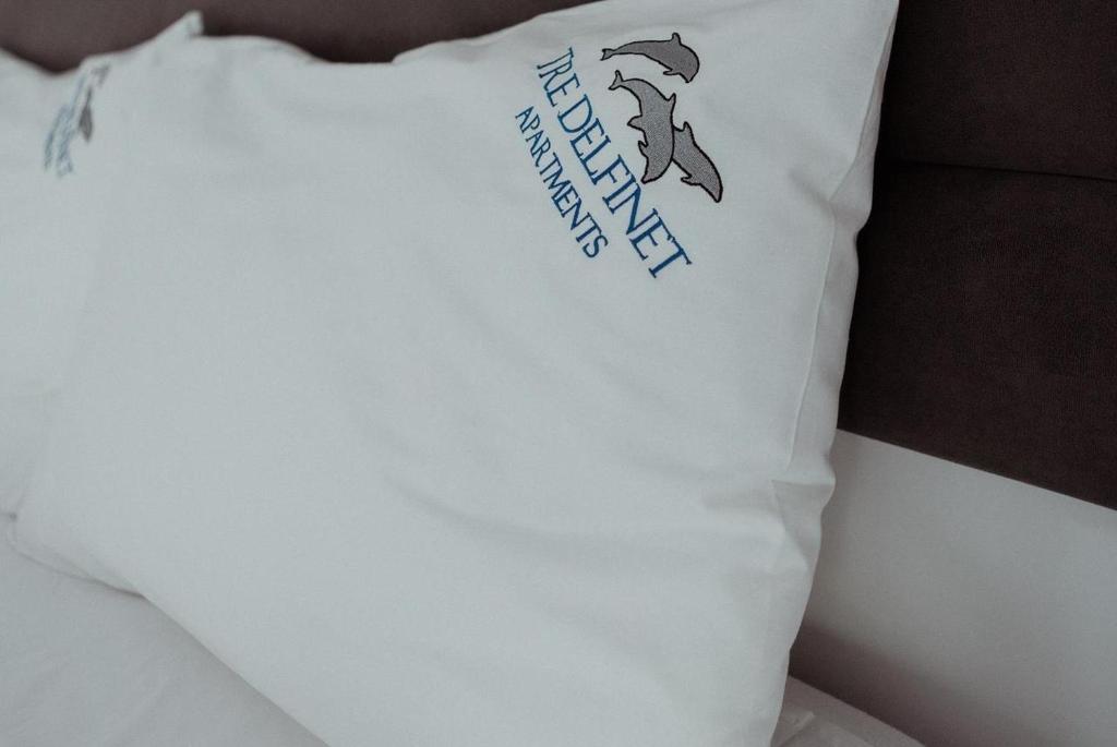Postel nebo postele na pokoji v ubytování Tre Delfinet