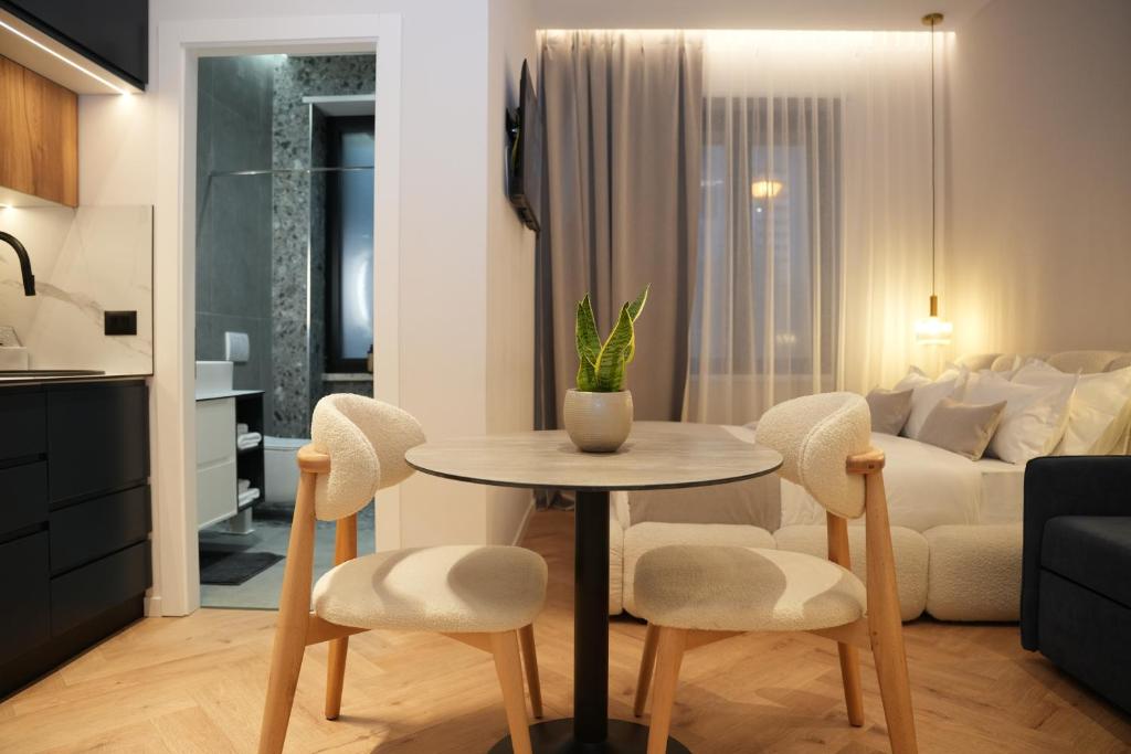 Posezení v ubytování NEA Deluxe Apart-Hotel