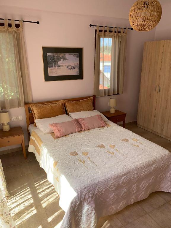 Postel nebo postele na pokoji v ubytování Katerina's SeaSide