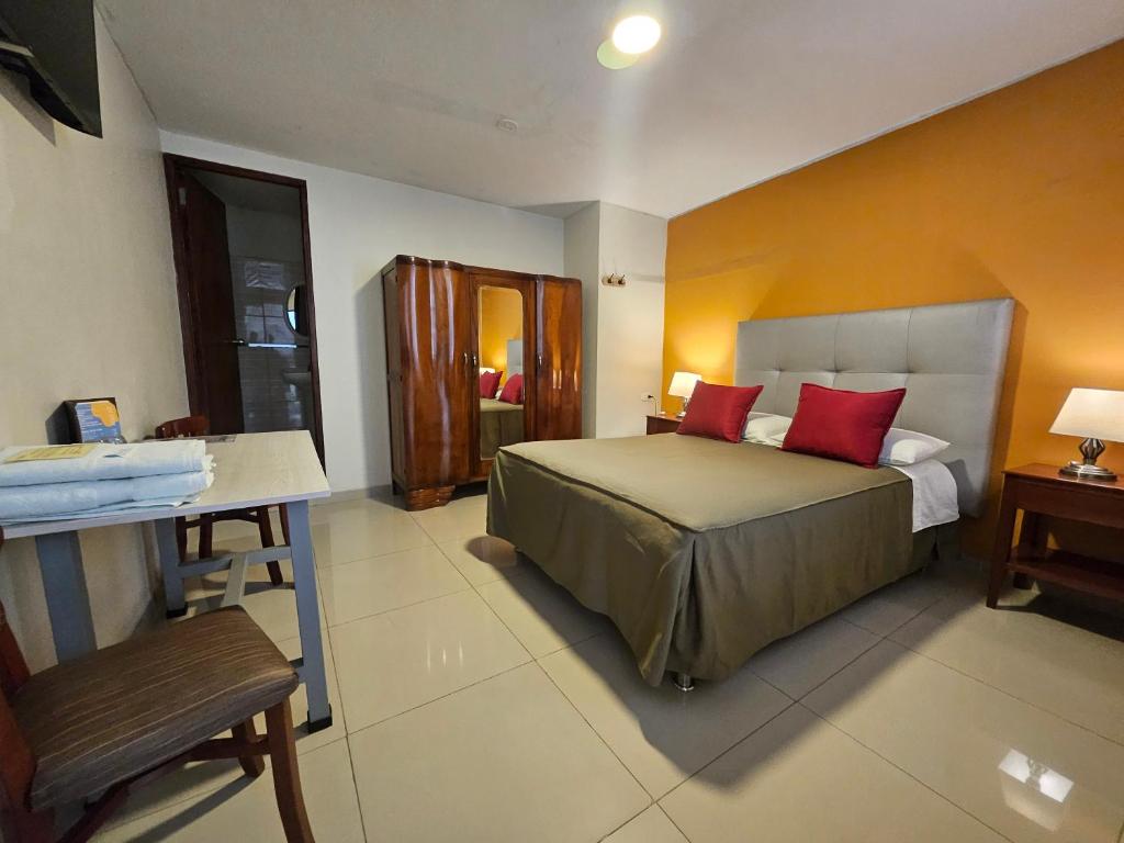 Postel nebo postele na pokoji v ubytování Hotel Acuario
