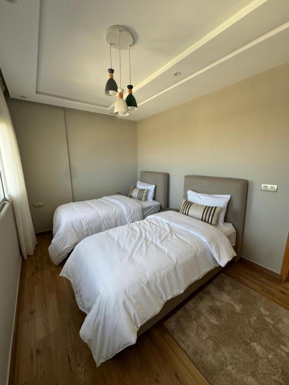 Postel nebo postele na pokoji v ubytování Ksar Labhar Second Nest