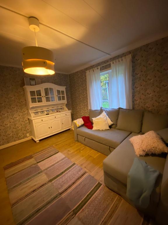 Posezení v ubytování Kleines Haus in Schweden