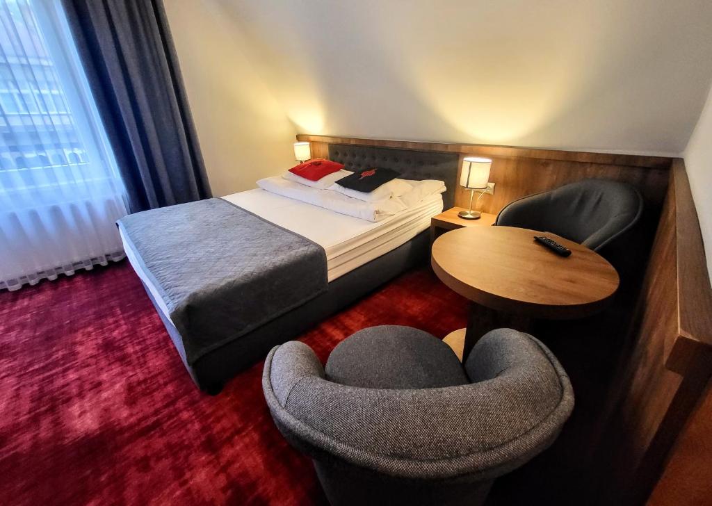 Postel nebo postele na pokoji v ubytování Magnolia