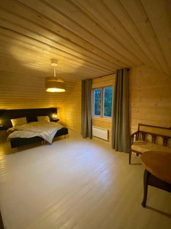 Postel nebo postele na pokoji v ubytování Kleines Haus in Schweden