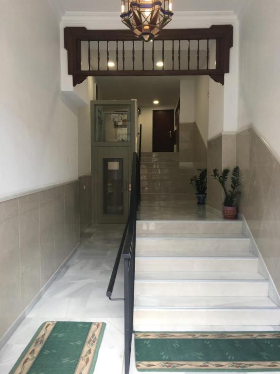 Łóżko lub łóżka w pokoju w obiekcie PISO CENTRO CON VISTAS ANTEQUERa