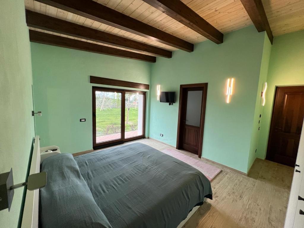Postel nebo postele na pokoji v ubytování B&B House