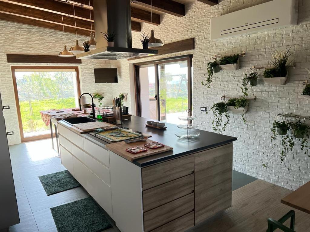 Kuchyň nebo kuchyňský kout v ubytování B&B House