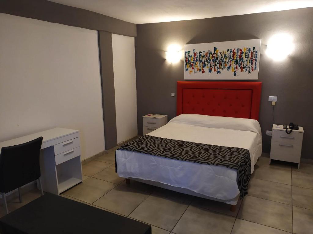 Postel nebo postele na pokoji v ubytování Hotel GBH