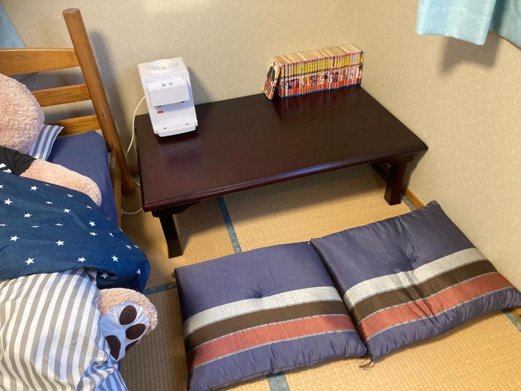 Postel nebo postele na pokoji v ubytování Yamaouyad & Cafe - Vacation STAY 95737v