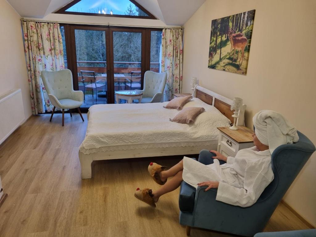 Postel nebo postele na pokoji v ubytování GOŚCINIEC GROBLICE