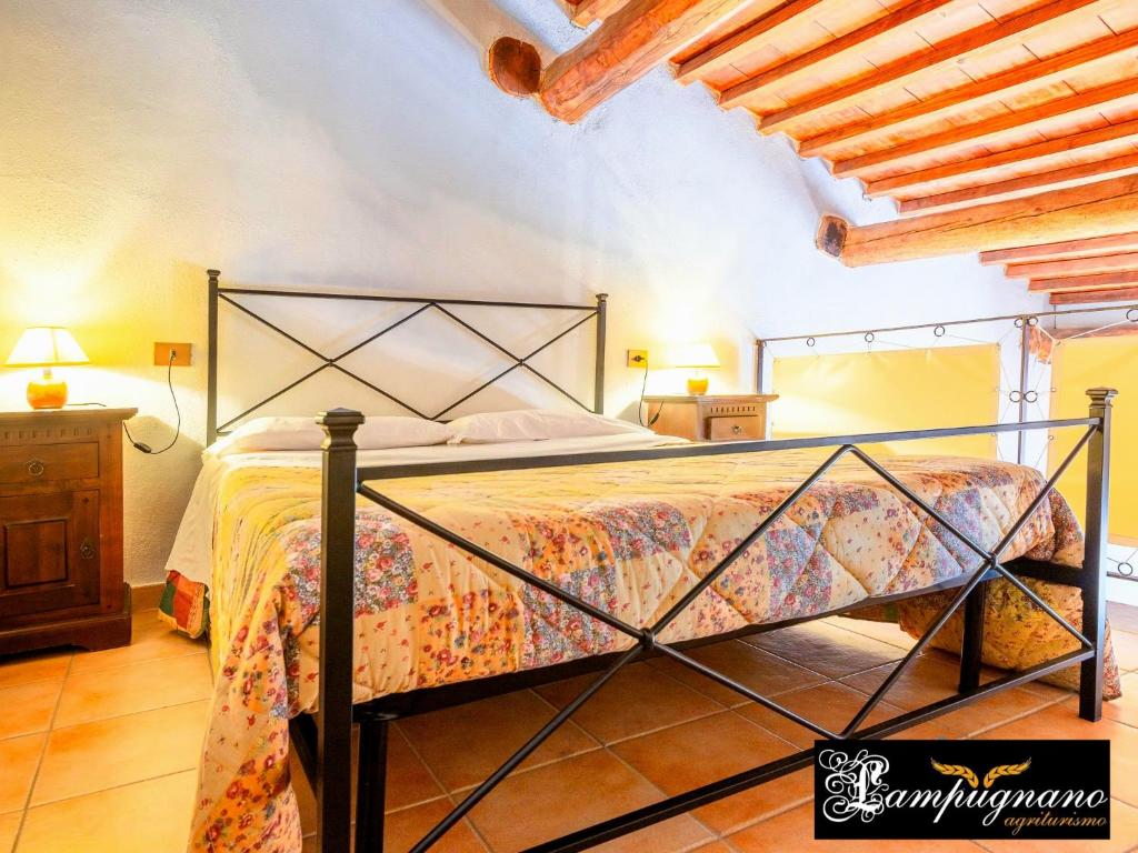 Postel nebo postele na pokoji v ubytování Agriturismo Lampugnano
