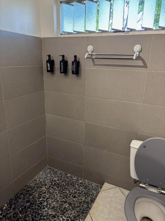 Koupelna v ubytování Manohei Lodge- Chambre indépendante Pamatai