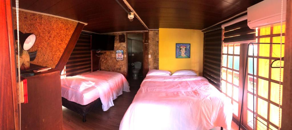 Letto o letti in una camera di El Arca de Pachue