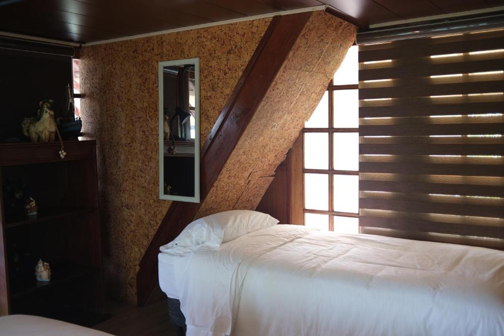 Letto o letti in una camera di El Arca de Pachue