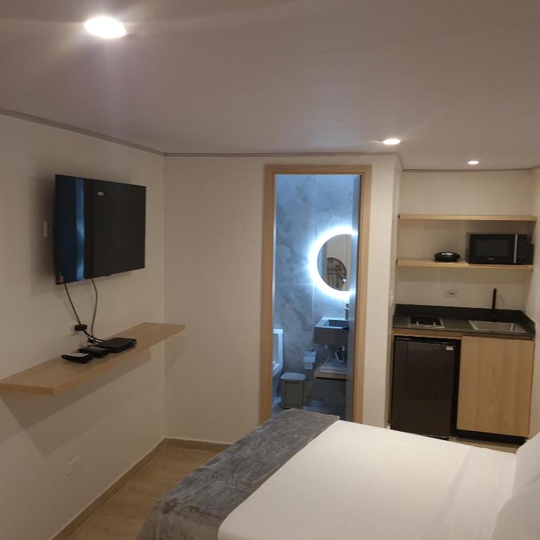 Uma TV ou centro de entretenimento em Santa Julia Alojamiento