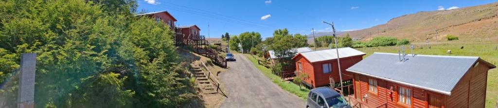an aerial view of a train station and a road at Cabañas Santa Flavia in Yacimientos de Río Turbio