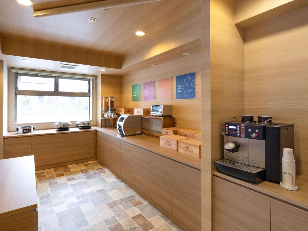 Příslušenství pro přípravu čaje a kávy v ubytování Comfort Inn Kofu Showa Inter