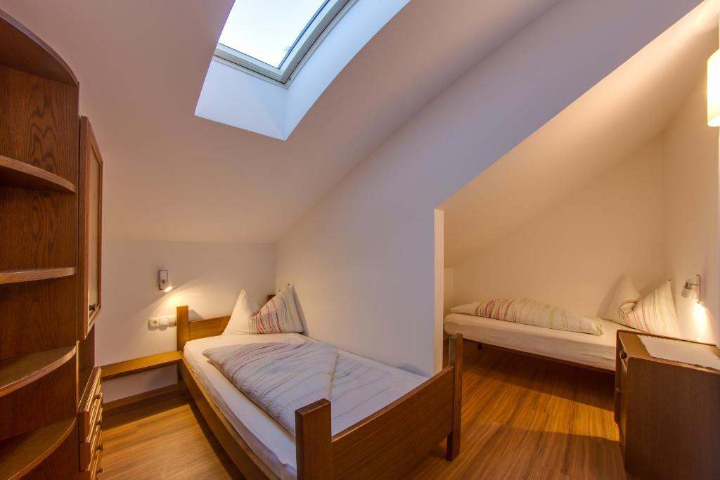 Posteľ alebo postele v izbe v ubytovaní Residence Silvia