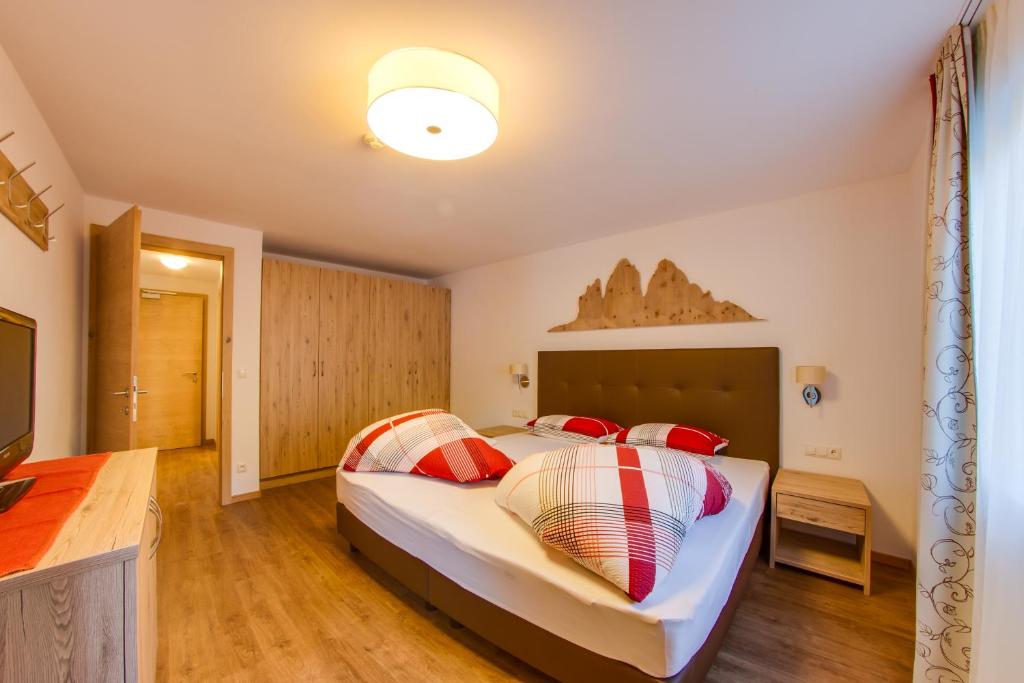 Posteľ alebo postele v izbe v ubytovaní Residence Silvia