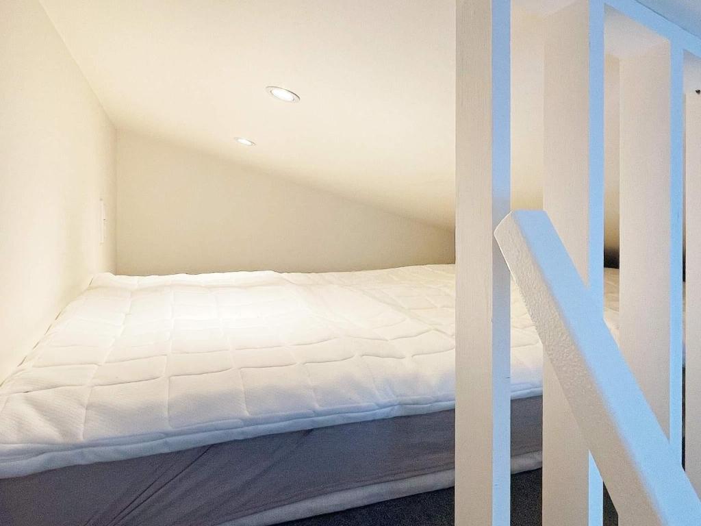 Postel nebo postele na pokoji v ubytování Holiday home Sölvesborg XII