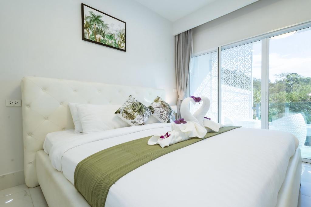 Postel nebo postele na pokoji v ubytování Koh Chang Luxury Pool Villas Premium