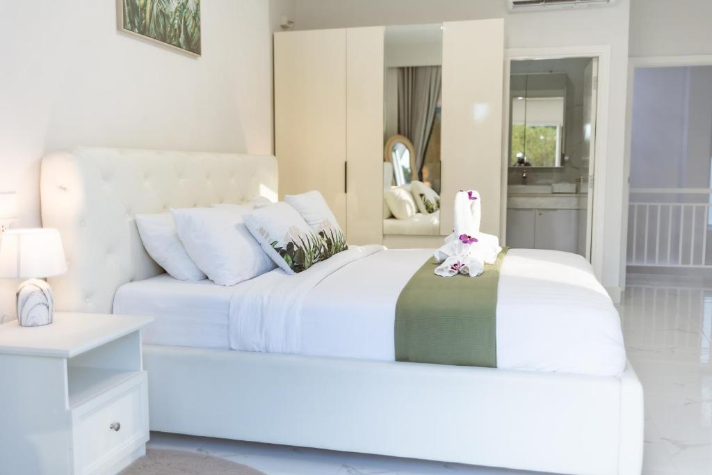 Postel nebo postele na pokoji v ubytování Koh Chang Luxury Pool Villas Premium