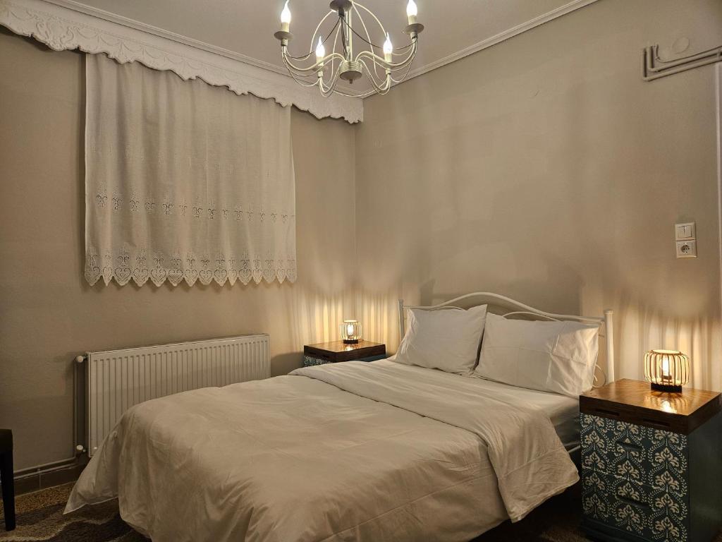Postel nebo postele na pokoji v ubytování Cleo's Home