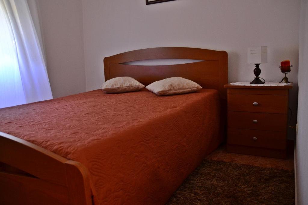 Postel nebo postele na pokoji v ubytování Monte da Vinha Nova
