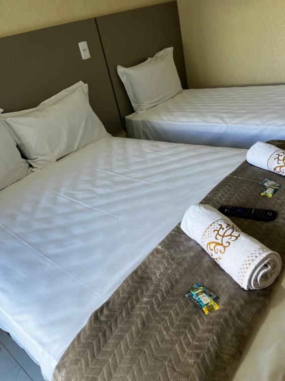 Postel nebo postele na pokoji v ubytování Hotel Aris