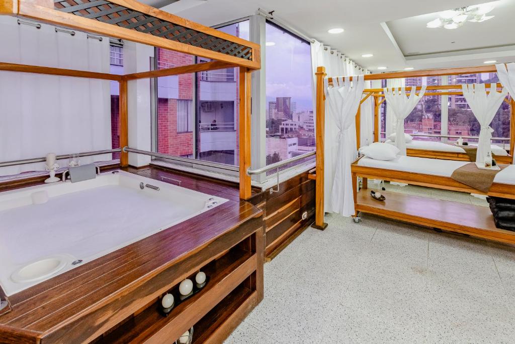 Postel nebo postele na pokoji v ubytování Hotel Du Parc