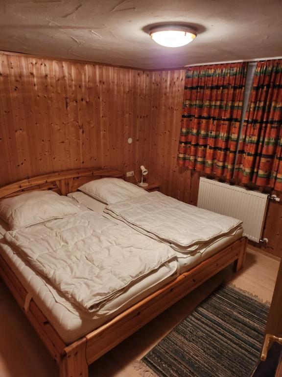 Postel nebo postele na pokoji v ubytování Alpenhaus Flügelbeck - Selbstversorgung