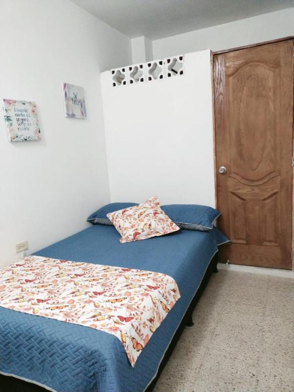Postel nebo postele na pokoji v ubytování Hospedaje Santa Teresita