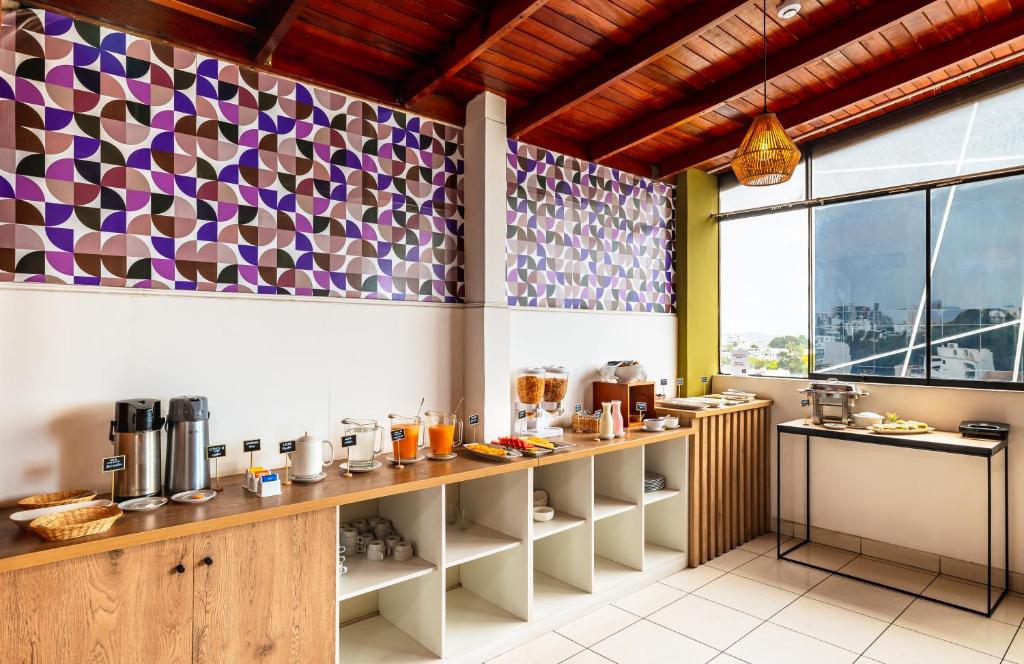Kuchyň nebo kuchyňský kout v ubytování Miraflores Suites Centro