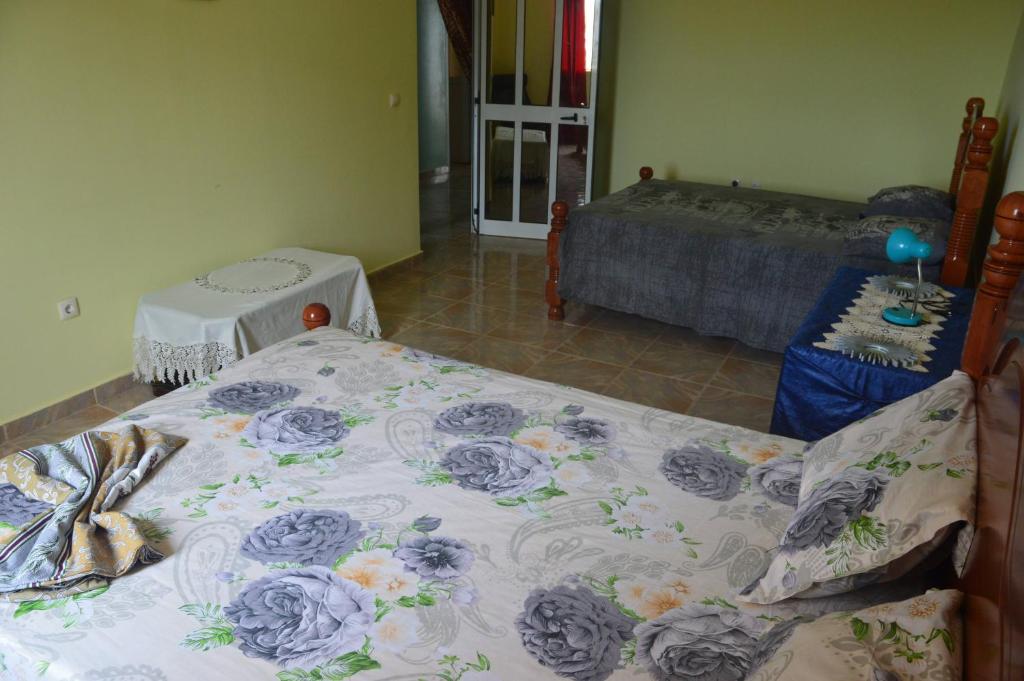 Postel nebo postele na pokoji v ubytování Casa Herminia