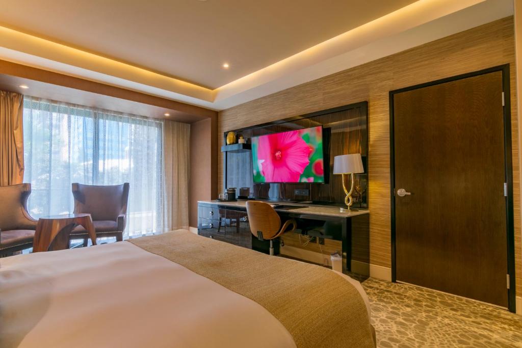 TV a/nebo společenská místnost v ubytování K Tower Boutique Hotel By Lucerna