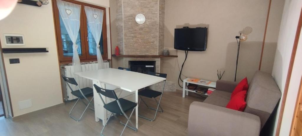 TV a/nebo společenská místnost v ubytování Casa Piccole Marmotte