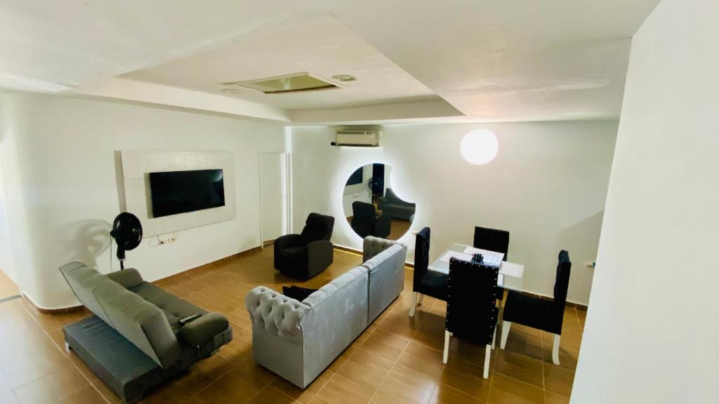 TV a/nebo společenská místnost v ubytování aparta hotel san jose
