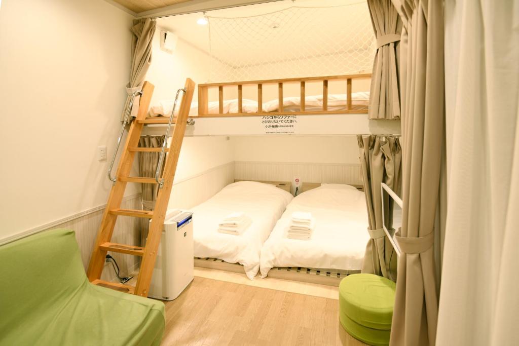 Postel nebo postele na pokoji v ubytování Mt Fuji Glamping TOURIST VILLA Kawaguchiko